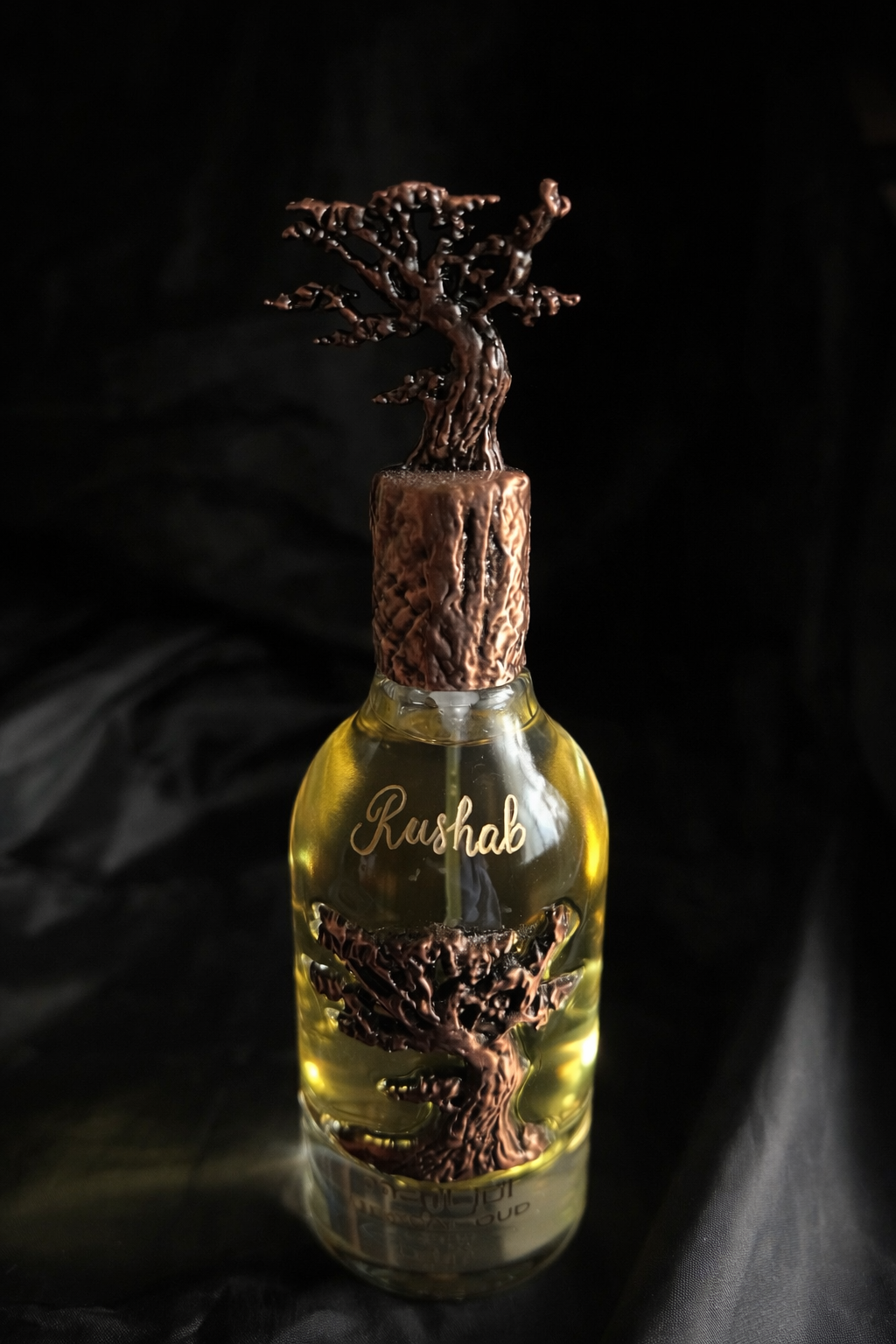 Personalised engraved perfume bottle with name Rushab and tree design in Qatar